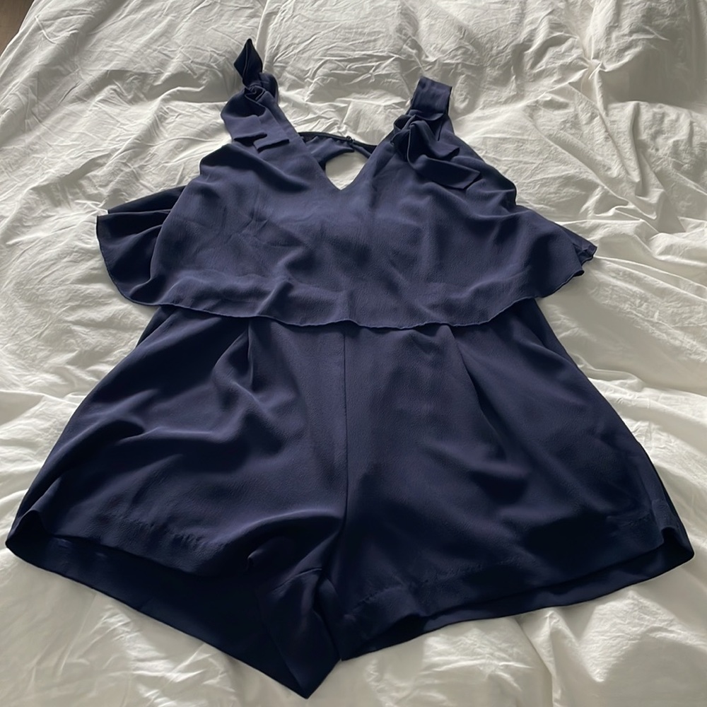 Navy open back romper